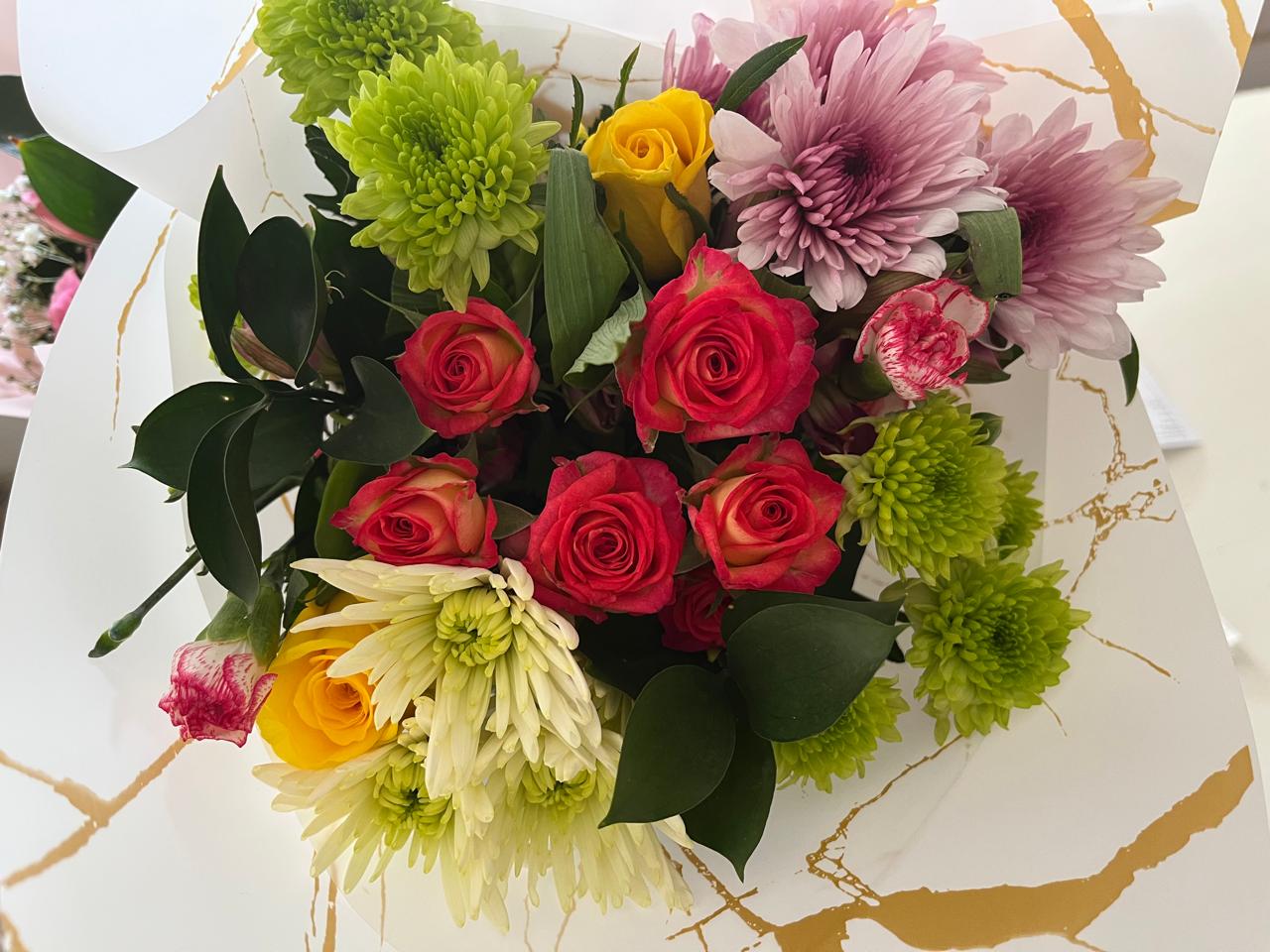 Colourful rose bouquet from above